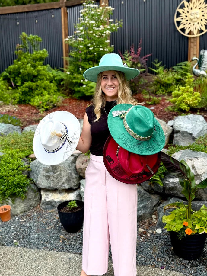 Honeybee Hat Co. founder with handmade hats